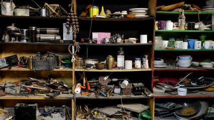 Shelves covered in old junk and stuff