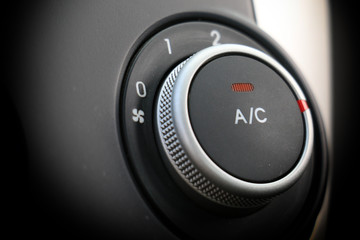 button to turn on the air conditioner