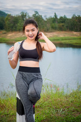 Sport and Health Lifestyle, Beautiful Young Woman Drinking Water After Training.