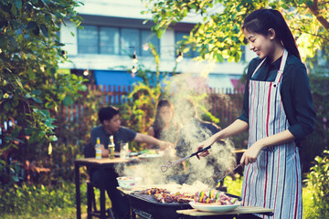 People asians barbecue party in the garden