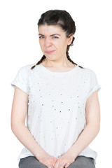 Woman in a white t-shirt feeling disgust