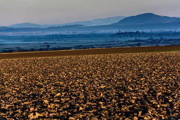  Farmland. Plowed field in the countryside a spring morning. The spring works in the field.