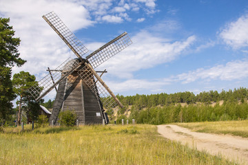 Fototapeta na wymiar Russia - Yakutia - Traditional roadside wooden windmill