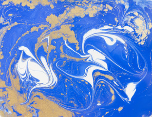 Blue and golden liquid texture. Watercolor hand drawn marbling illustration. Ink marble background.