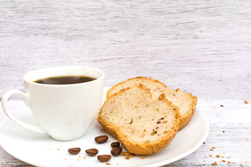 hot coffee with fresh bread on the white table for breakfast