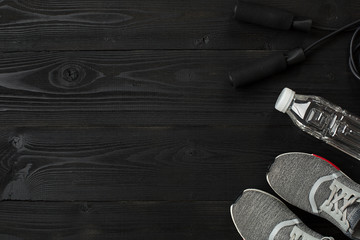 Sports accessories for fitness on the wooden floor. Healthy lifestyle concept.