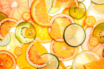 Sliced citrus fruits background.