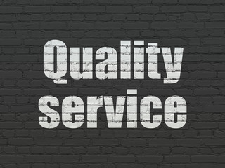 Obraz premium Finance concept: Quality Service on wall background
