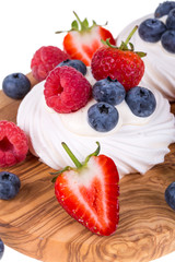 Pavlovas on olive wood board