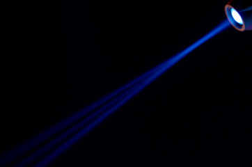 Beam of blue light on black . Applied to a searchlight torch