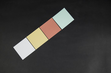 color note sticker on blackboard