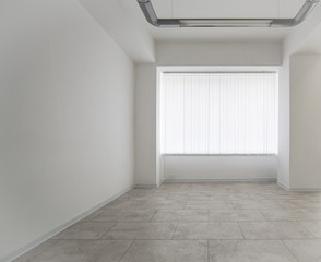 White room with window, empty space