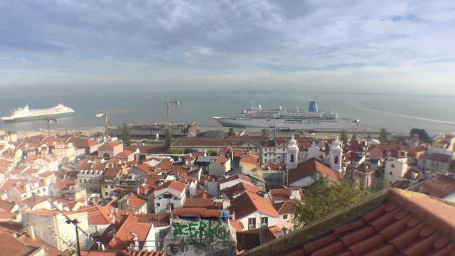 City of Lisbon High Angle View With Huge Cruise Ships. Lisbon is the capital and the largest city of Portugal