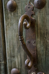Antique handle. Detail of an old door
