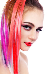 Fototapeta premium Portrait of young beautiful girl with colorful ponytail over white background, copy space
