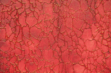 red background of textured plaster with streaks. art background
