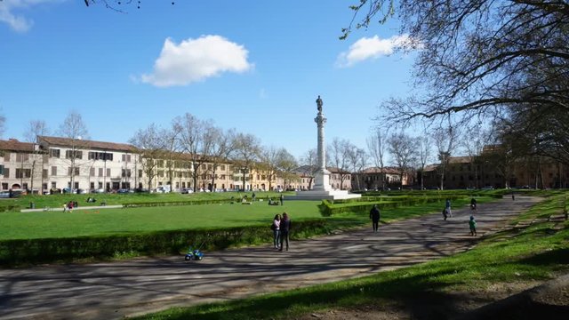 Piazza Ariostea in Ferrara, region of Emilia Romagna, Italy. The area is decorated with a statue of Ludovico Ariosto on a stone column.
