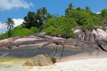 Basalt on tropical coast. Baie Lazare, Mahe, Seychelles