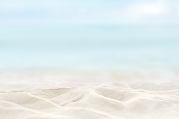 Sand beach tropical with blurred sea sky and sunny background, summer day, copy space or for product.