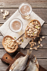 Lager beer glasses and snacks