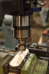 Milling machine cutting metal detail