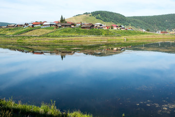 Fototapeta premium Urral mountain view and town with lake and forrest
