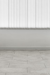 Parquet flooring, tile and white wall