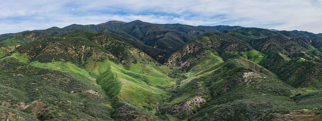 Hills and valleys lead into a California mountain range in the southwest of the country.