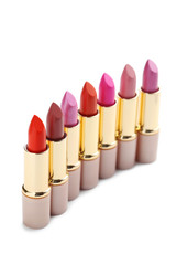Obraz premium Colorful lipsticks isolated on a white