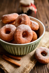 Traditional American doughnuts with cinnamon and sugar icing