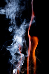 Close up view of natural flame with smoke