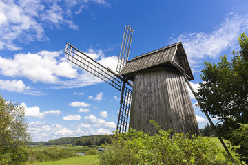 Fototapeta na wymiar Beautiful rural landscape with old windmill