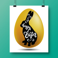 Poster with a handwritten phrase-happy easter and the silhouette of a rabbit with gold egg