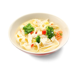 Chicken noodle soup in bowl on white background