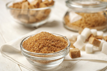Bowl with brown sugar on napkin