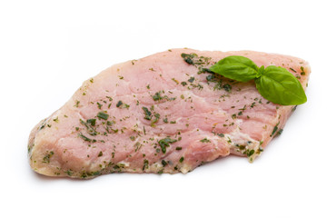 Steak with spices isolated on white background.