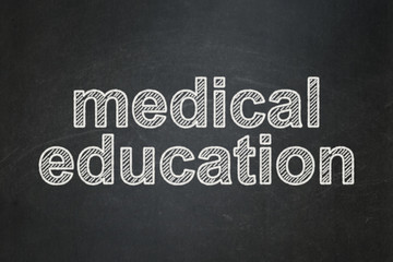 Fototapeta premium Education concept: Medical Education on chalkboard background