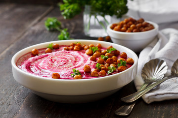 Beet cream soup with baked chickpeas