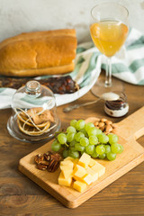 Snacks for wine: grapes, cheese, nuts