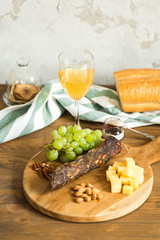 Snacks for wine: grapes, cheese, nuts