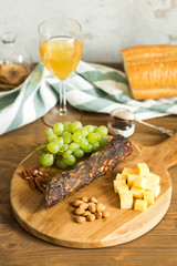 Snacks for wine: grapes, cheese, nuts