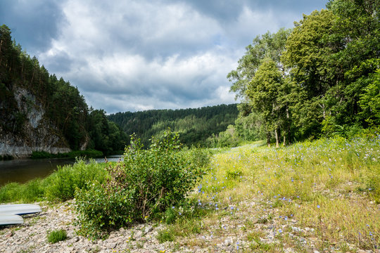 Urral Mountains landscape along white river