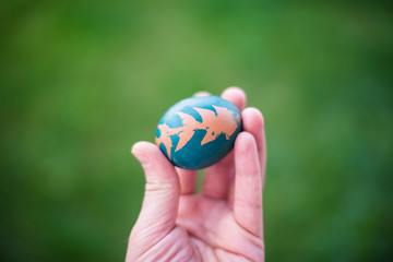 Easter egg in hand