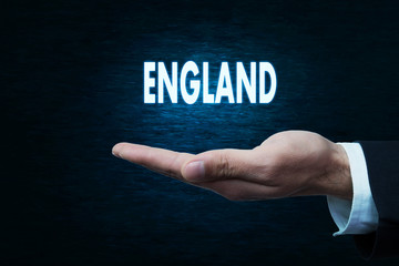 Hand holding England word