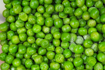 Green peas as background texture. Pea pattern.