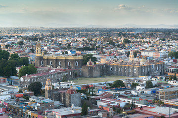 Obraz premium Cholula, Mexico - circa february 2017: Aerial view of downtown and of Convent of San Gabriel in Cholula, Puebla