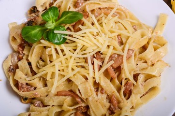 Pasta with seafood. Tagliatelle with squid