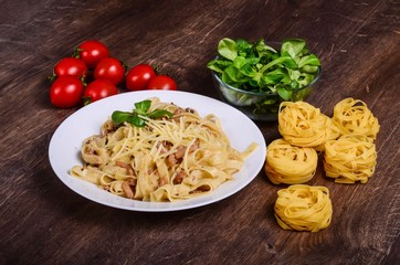 Pasta with seafood. Tagliatelle with squid