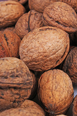Walnuts as background. Walnut texture pattern. Walnut shell.