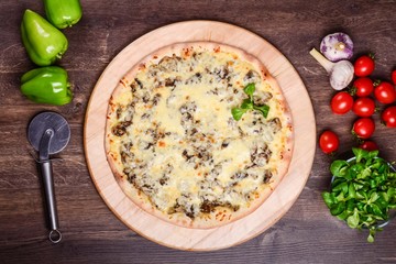 Thin pizza with mushrooms and cheese